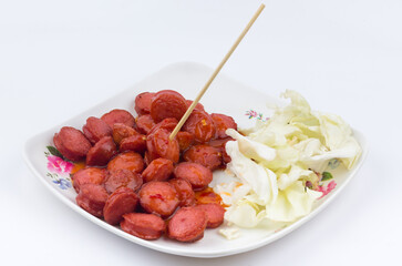 sausages slices on a plate