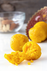 Popular Authentic Indian sweets Motichoor Laddu made from besan or chickpeas flour. Vegetarian and healthy food. Isolate. White background.