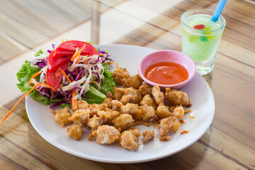 deep fried chicken tendons Clear focus on specific areas of the image./ soft Focus