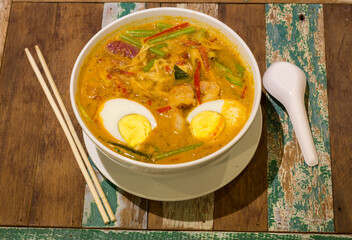 prawn mee, prawn noodles on wooden