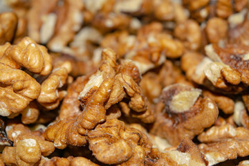 Peeled walnuts close-up. Surface texture. Healthy diet.