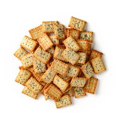 Pile of small salty rectangular crackers with poppy and sesame seeds isolated on a white background. Crispy wheat flour snack and beer appetizer.