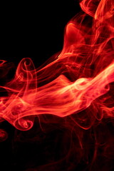 Red smoke on black background