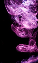 Purple smoke on black background