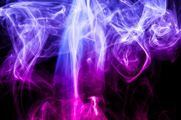 Fototapeta premium Kolorowy dym na czarnym tle
