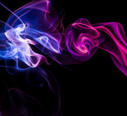 Colored smoke on black background
