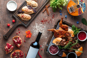 The oriental cuisine. Restaurant uzbek manti with beef, grilled chicken, beef. National middle asian dish.