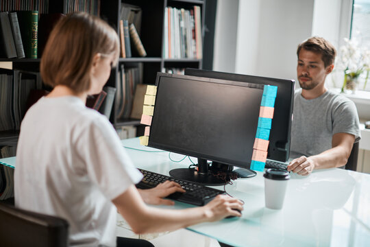 Team of professional programmers engineers write code working on new project, photography for ad IT technology