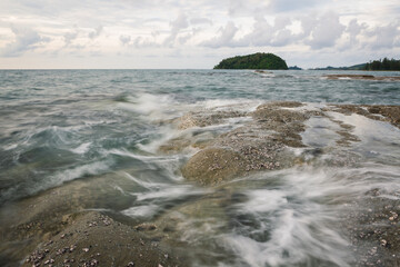 Long exposure sea and rocks at twilight