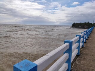 Sea with Turbid water, coastal view from bridge,Confluence of river into sea, winter time sea,sea view after rain