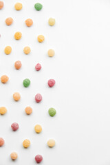 Close up of colorful fruit caramel, hard sugar candies or boiled sweets isolated on white background. 