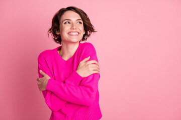 Photo of overjoyed lady hands hug herself shoulders enjoy joyful soft cloth laundry warmth toothy...