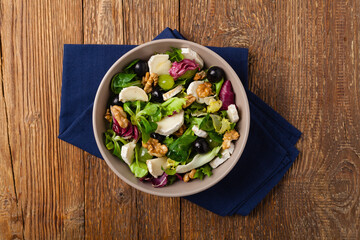 Italian spring salad with goat cheese, grapes and walnuts. Served with croutons.