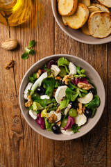 Italian spring salad with goat cheese, grapes and walnuts. Served with croutons.