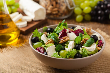Italian spring salad with goat cheese, grapes and walnuts. Served with croutons.