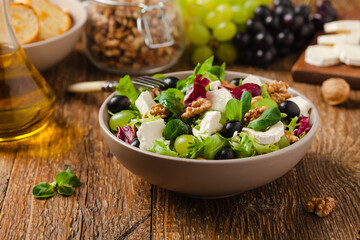 Italian spring salad with goat cheese, grapes and walnuts. Served with croutons.