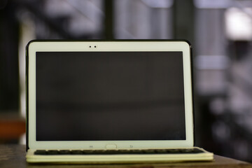 
A laptop placed on the table On a natural background