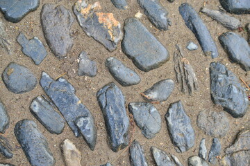 Old stones in the ground.