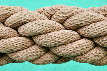 Thick rope on blue background