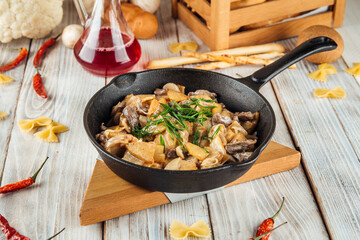 Beef fried creamy sauce with potatoes champignons