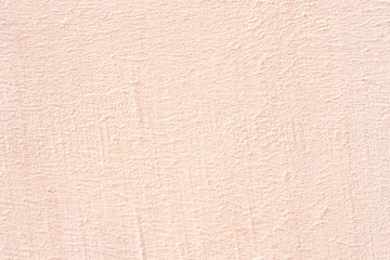 Pink stucco texture. Designer interior background. Abstract architectural surface.