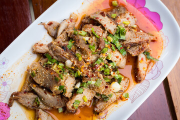 Thai food name is Grilled pork with spicy salad, Thai food
