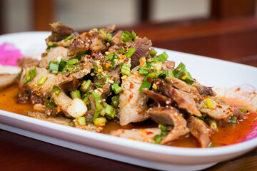 Thai food name is Grilled pork with spicy salad, Thai food