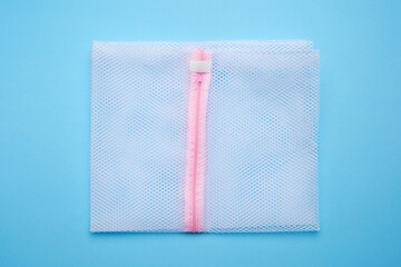bag for washing clothes in the drum of a washing machine from a white net