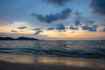Fototapeta na wymiar Sunrise on the tropical beach. Andaman sea. Thailand