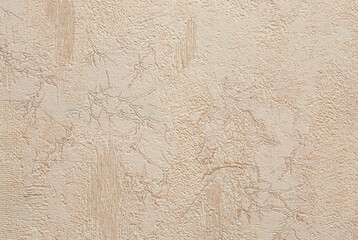 Beige painted stucco wall. Decorative plaster walls. Background texture.