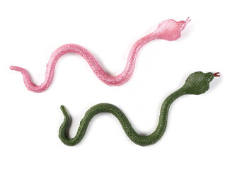 Colorful rubber snakes, toys isolated on white background, top view