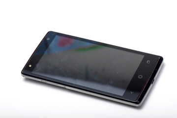 Macro shot of candybar shaped smart phone on a white isolated background