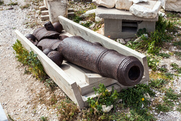 Old broken bronze canon gun