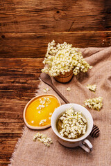Tea from fresh elder flowers. Hot drink, honey, alternative medicine