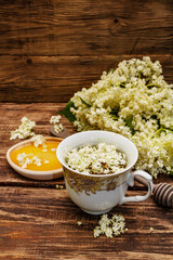 Tea from fresh elder flowers. Hot drink, honey, alternative medicine