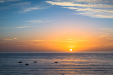 Sunset over the Gulf of Oman, Emirate of Fujairah. Holidays in UAE. A very beautiful sun and sky, view from hotel.