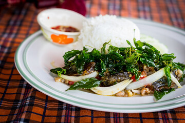  STIR FRIED CRISPY BASIL WITH PORK AND BLACK PRESERVED EGGS