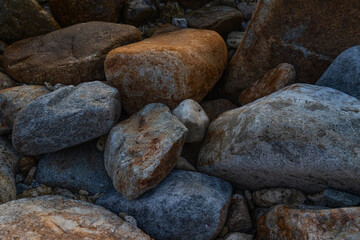 Sea big different stones background.