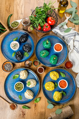 Manti on a blue plate. Close-up shot in the decor