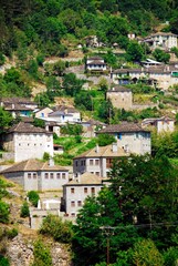 Fototapeta na wymiar Panoramic view of the traditional stone-made Kipoi village, one of the 45 villages known as Zagoria or Zagorochoria in Epirus region of southwestern Greece.