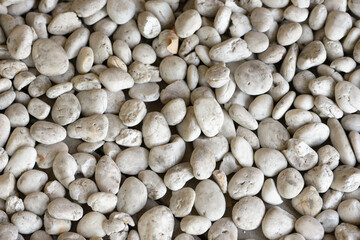 Full frame shot of white pebbles outdoors