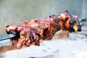 Roasted meat at the square of Aristi village. Zagoria area, Epirus region, northwestern Greece.