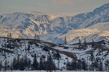 Russia. South Of Western Siberia, Mountain Altai. Sunset on the North Chui mountain range in the...
