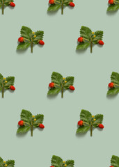 Wild strawberries seamless pattern on green background
