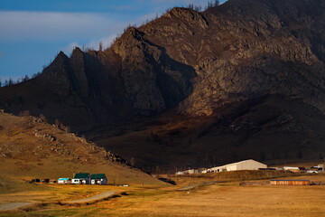 Russia. South Of Western Siberia. mountain Altai. An expressive sunset on the outskirts of the village of Ongudai on the Chui highway.