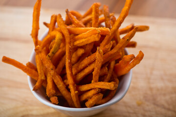 Steakhouse side dishes. Asparagus, salad, tomatoes, mashed potatoes, red onions, cream cauliflower, pickled peppers, seasoned meats served in cast iron skillet. Traditional appetizer items.
