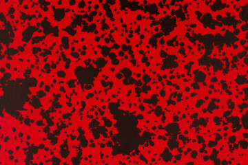 Black and red textured cardstock paper closeup background