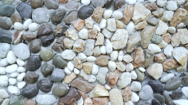 Zooming Move beautiful hand made Small round stone   wall, loft interior. Qualitative full hd footage.