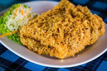 Crispy catfish salad with green mango