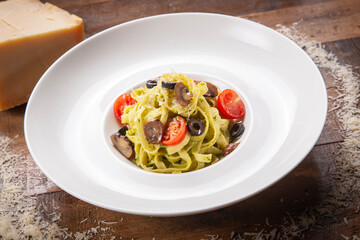 pasta with tomato sauce and basil